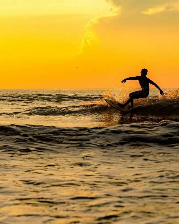 surfing in down south beach in srilanka